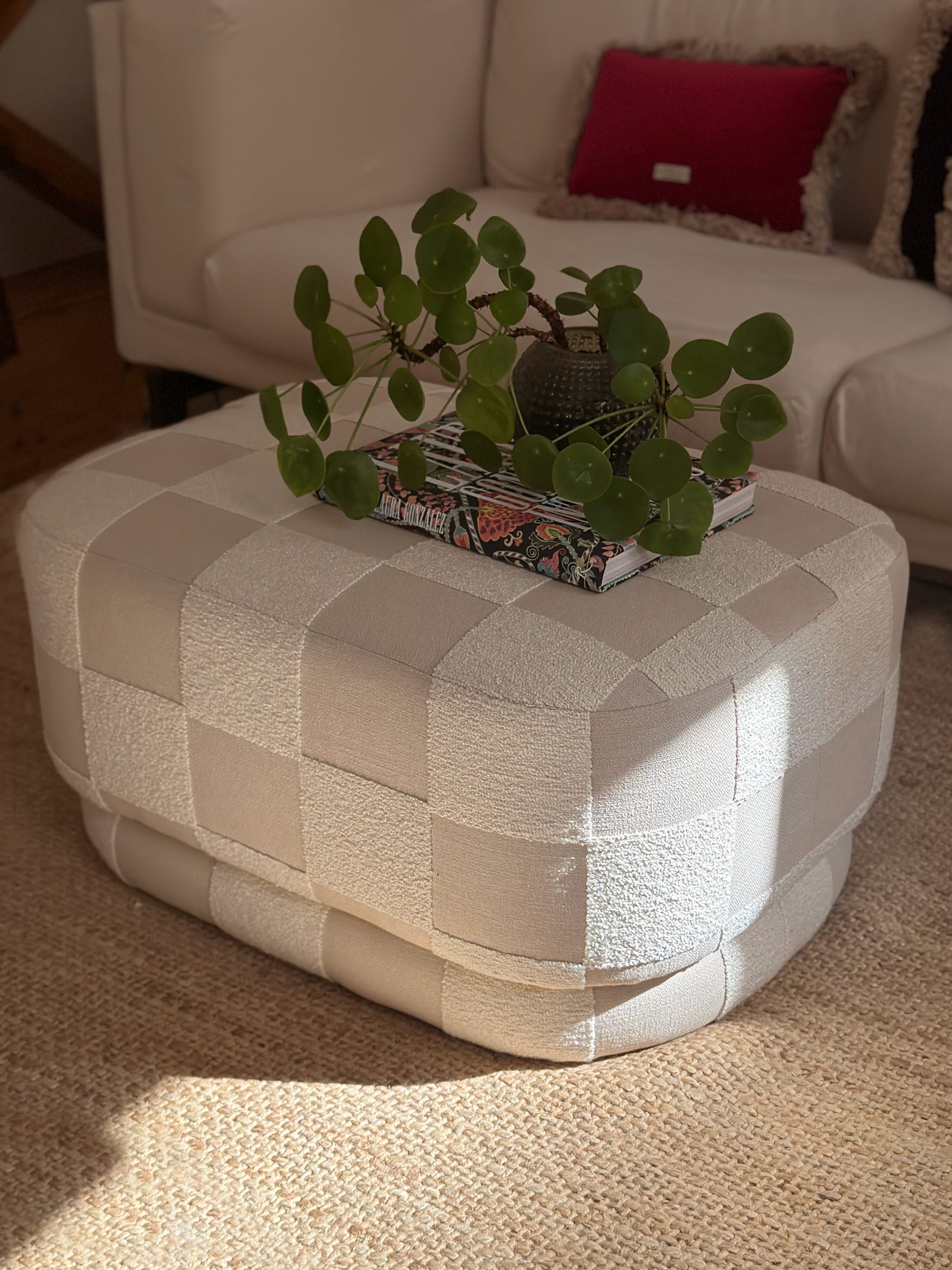 Large designer ottoman used as a coffee table, Onix pouf in geometric checkerboard upholstery by OPALA Home Talismans 
